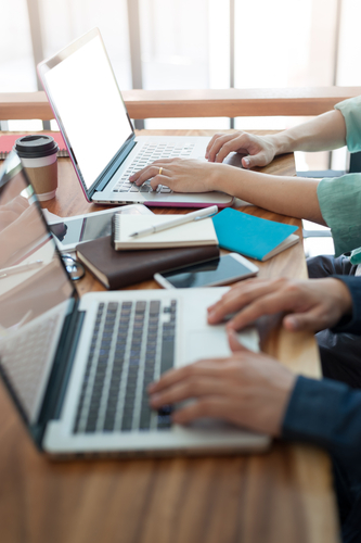 Laptop computers on a desk