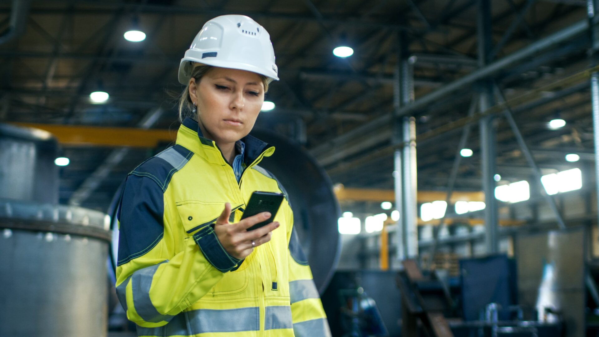 Frontline Worker Using Mobile Scheduling Tool on the Job